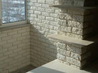 отделка декоративным камнем стен на балконах