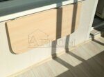Откидной столик на балконе и обшивка стен пластиком, пластиковыми панелями