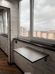 обшивка балкона ламинатом и откидной стол