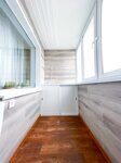 Белый раздвижной шкаф на балкон
