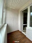 Ремонт. Белая натуральная пробка на балконе, пластиковые рамы, подоконники с акриловым покрытием